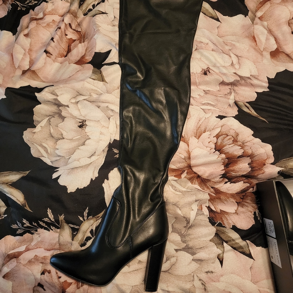 Thigh high boots.